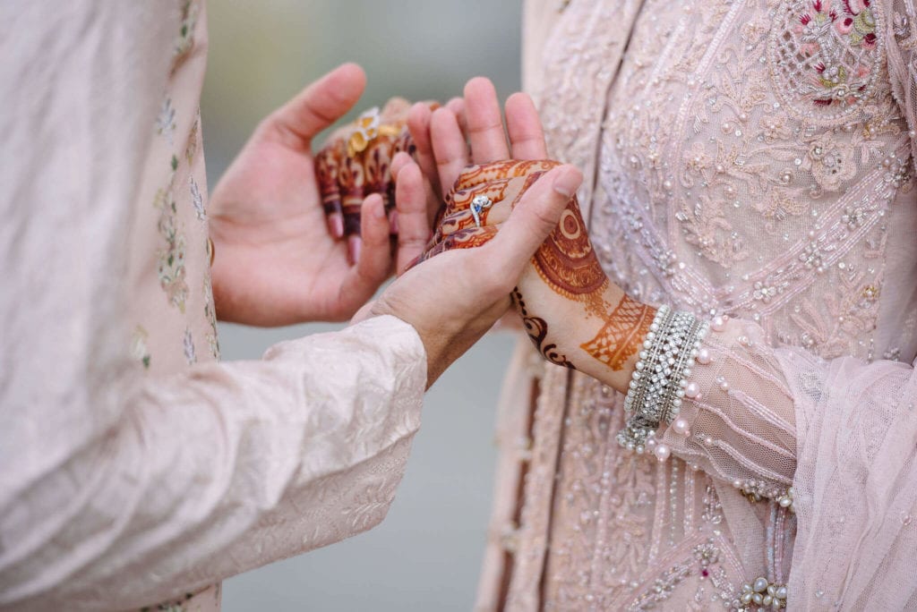 Wedding Couple Holding Hands